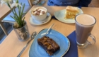 Freshly baked brownie and cake with coffee